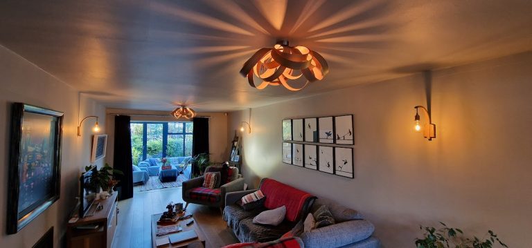 Living room lights creating a pattern on the ceiling with modern lamp shades