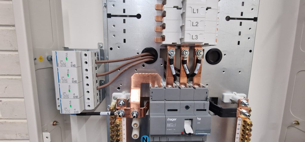 Fuse box with neatly laid out cables and junctions
