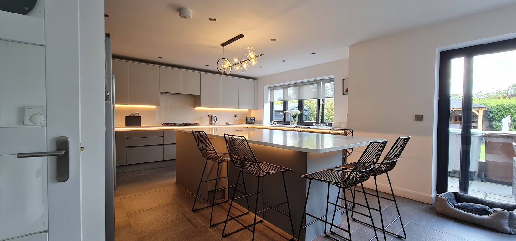 a large kitchen in a Cheshire house with electrics fitted by Fully Wired in Sandbach